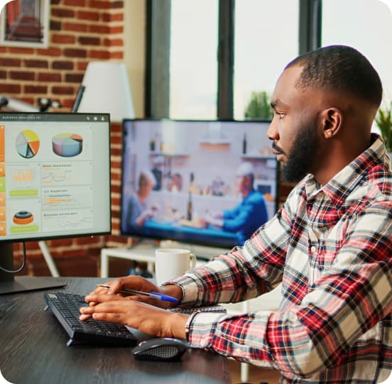 A man shopping on his laptop